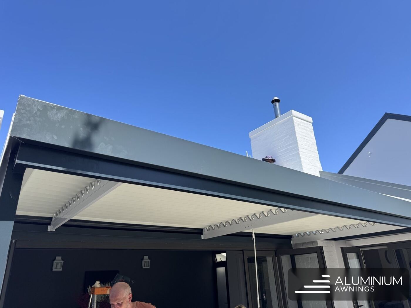 Charcoal frame white louvre roof claremont
