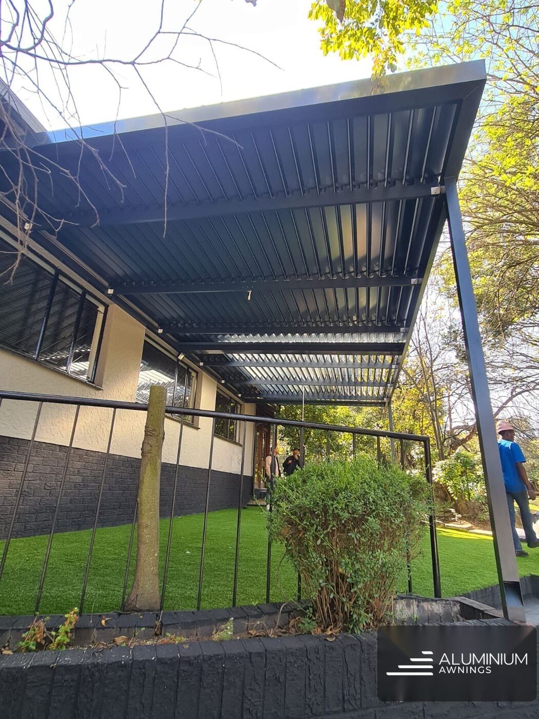 Charcoal aluminium awning on a Durbanville patio