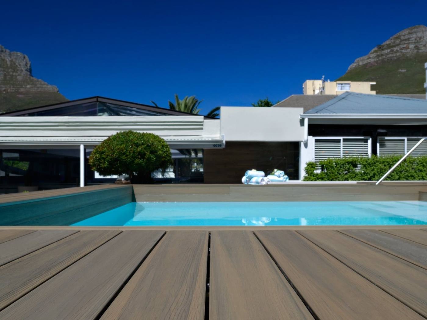 Composite pool deck and surround with Lion's Head behind